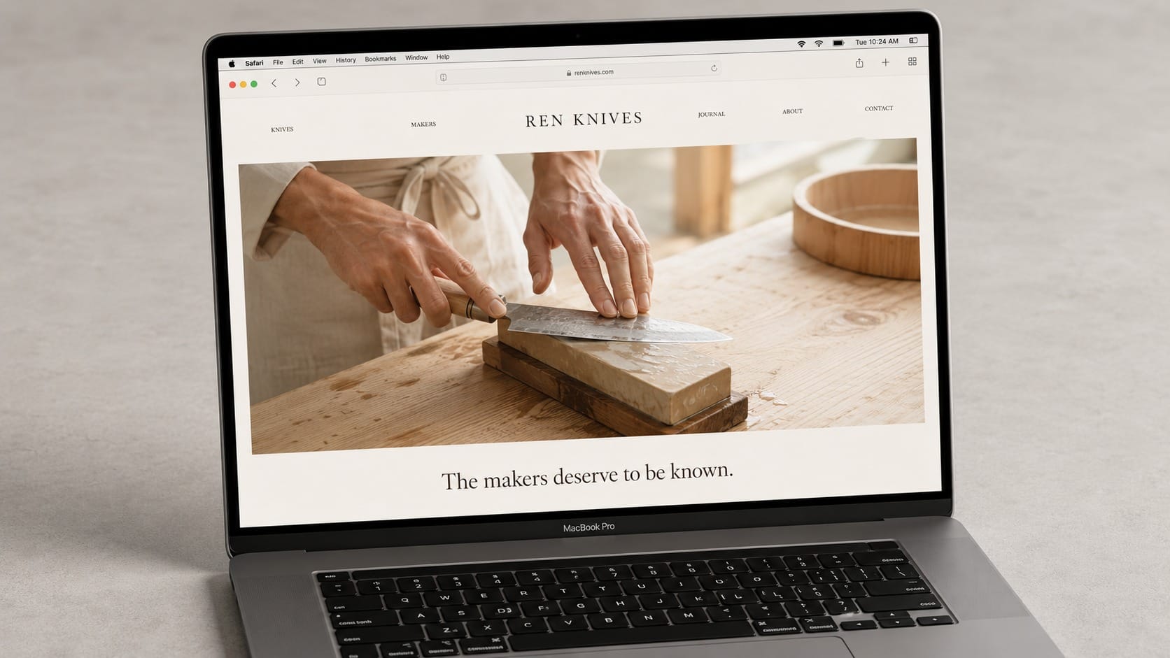 Minimal luxury website homepage for Ren Knives displayed on a MacBook Pro screen